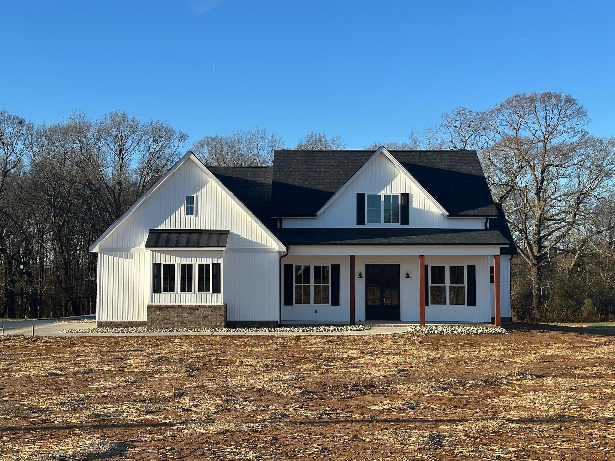 front exterior view of modern ranch home, white